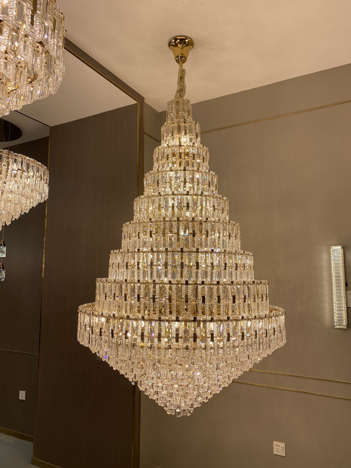 chandelier,foyer, living room, staircase,oversized, extra large, shining, crystal, multi-tiered, golden,luxury
