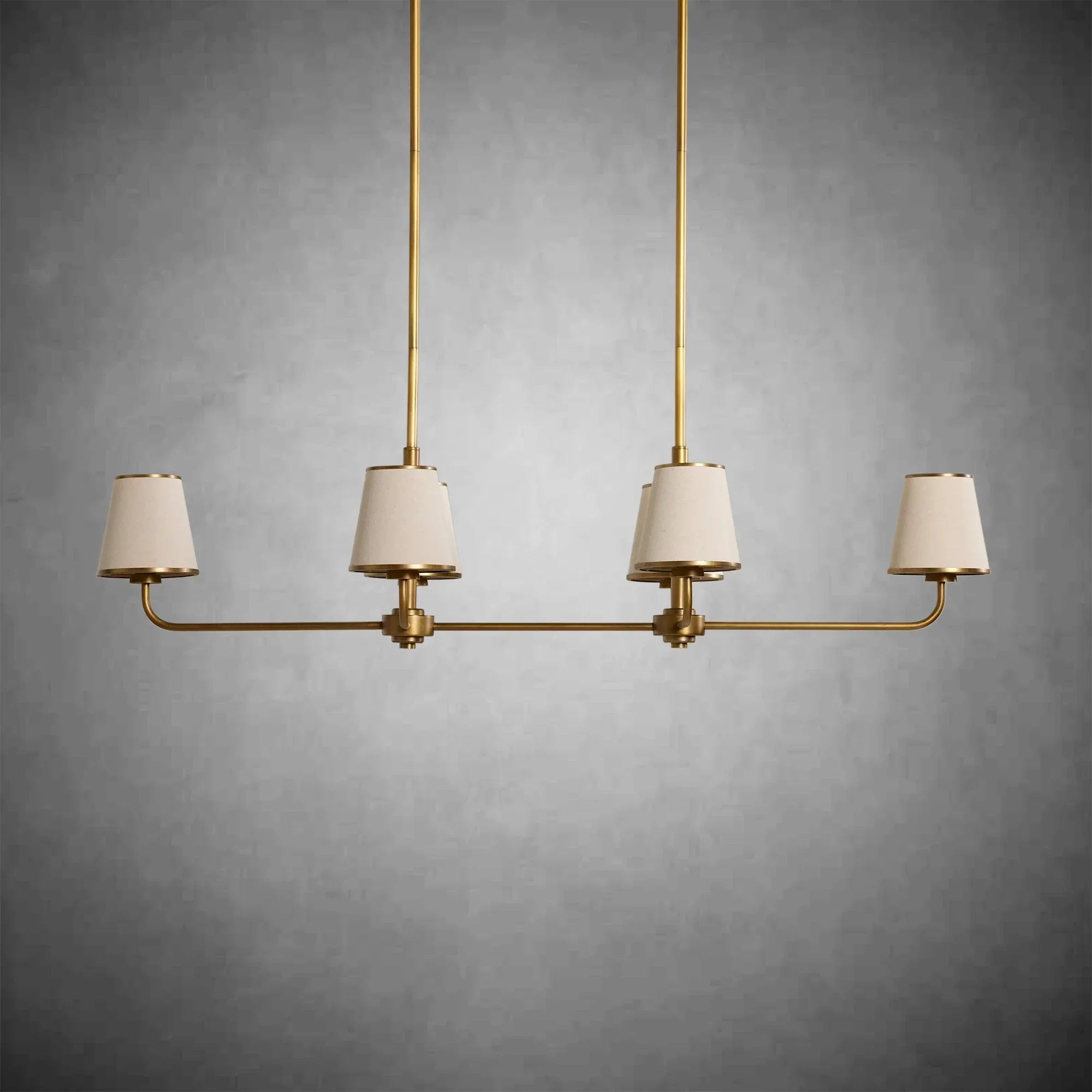 https://cdn.shopify.com/s/files/1/0736/8795/7790/files/adria-linear-chandelier-flax-2.webp?v=1772445244