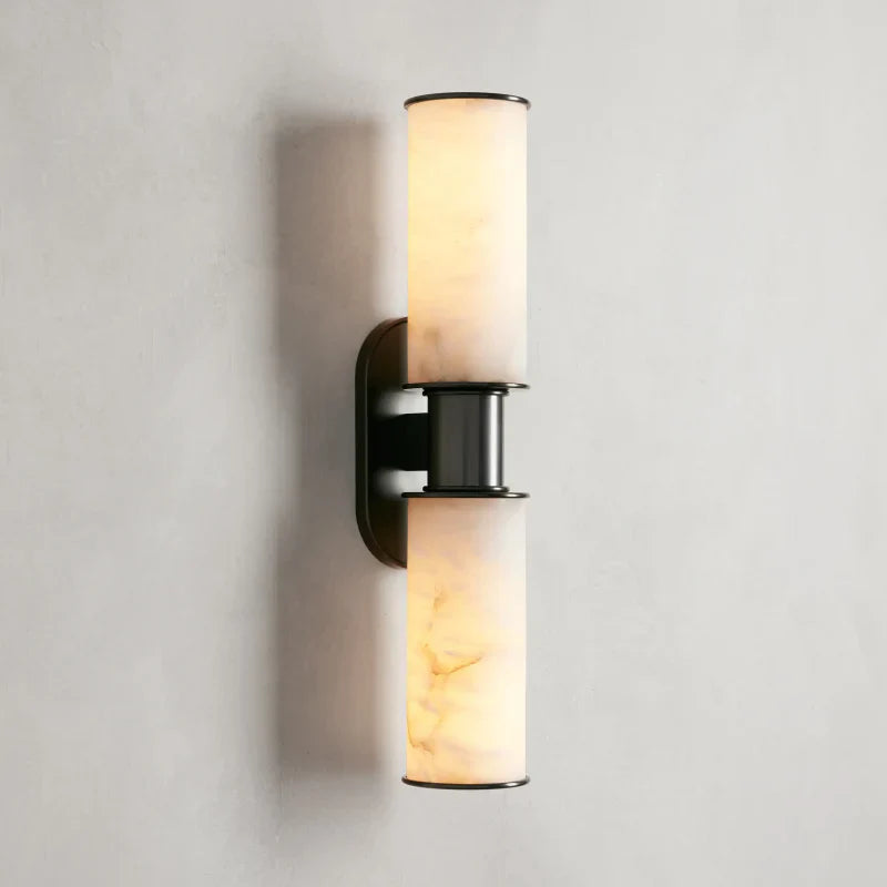 https://cdn.shopify.com/s/files/1/0736/8795/7790/files/harlin-2-light-wall-sconce-in-alabaster-merlin-lamps-10.webp?v=1765382517