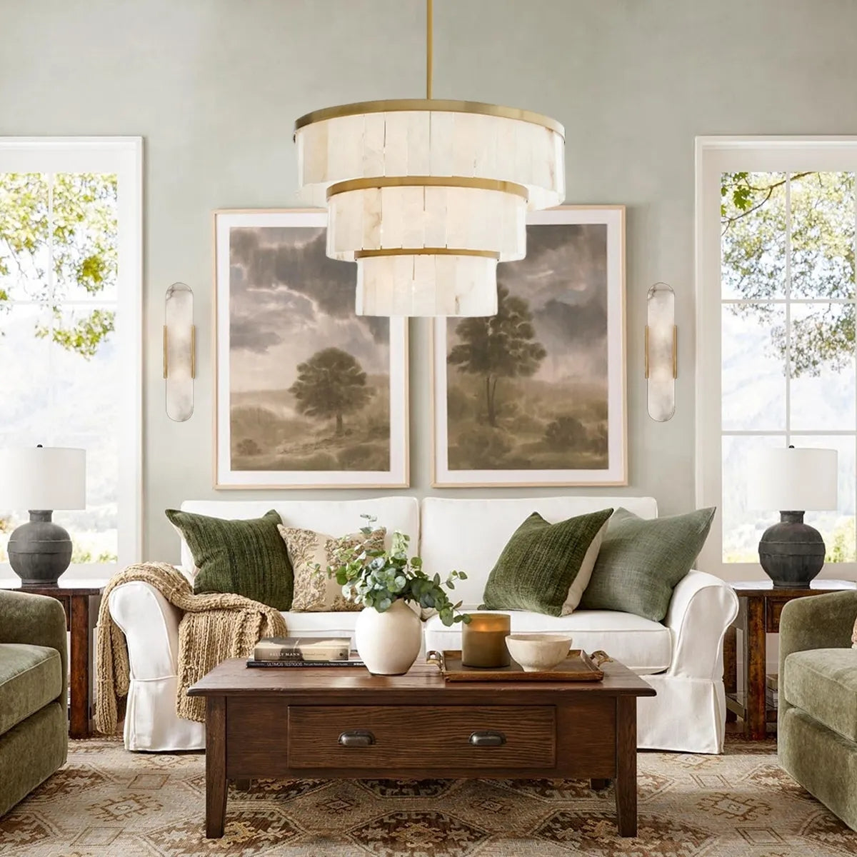 3-tier brass and alabaster chandelier hanging in a modern living room with a fireplace