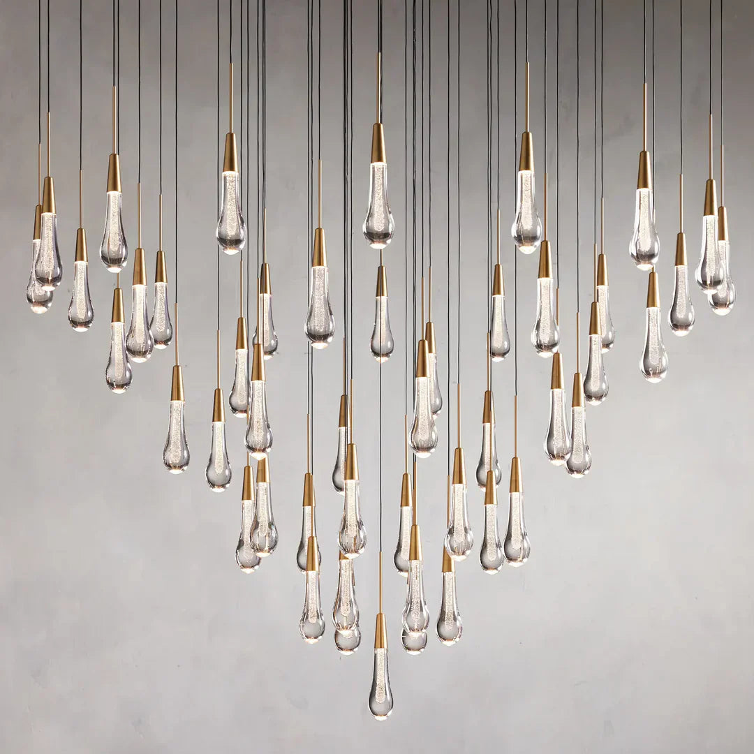 https://cdn.shopify.com/s/files/1/0736/8795/7790/files/solitaire-modern-17-24-36-58-round-chandelier-lighting-merlin-lamps-10.webp?v=1765374444