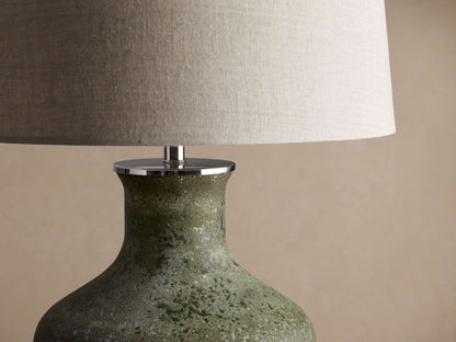Close-up of Galena Table Lamp, featuring a textured, sand-blasted green glass base and a light linen shade.