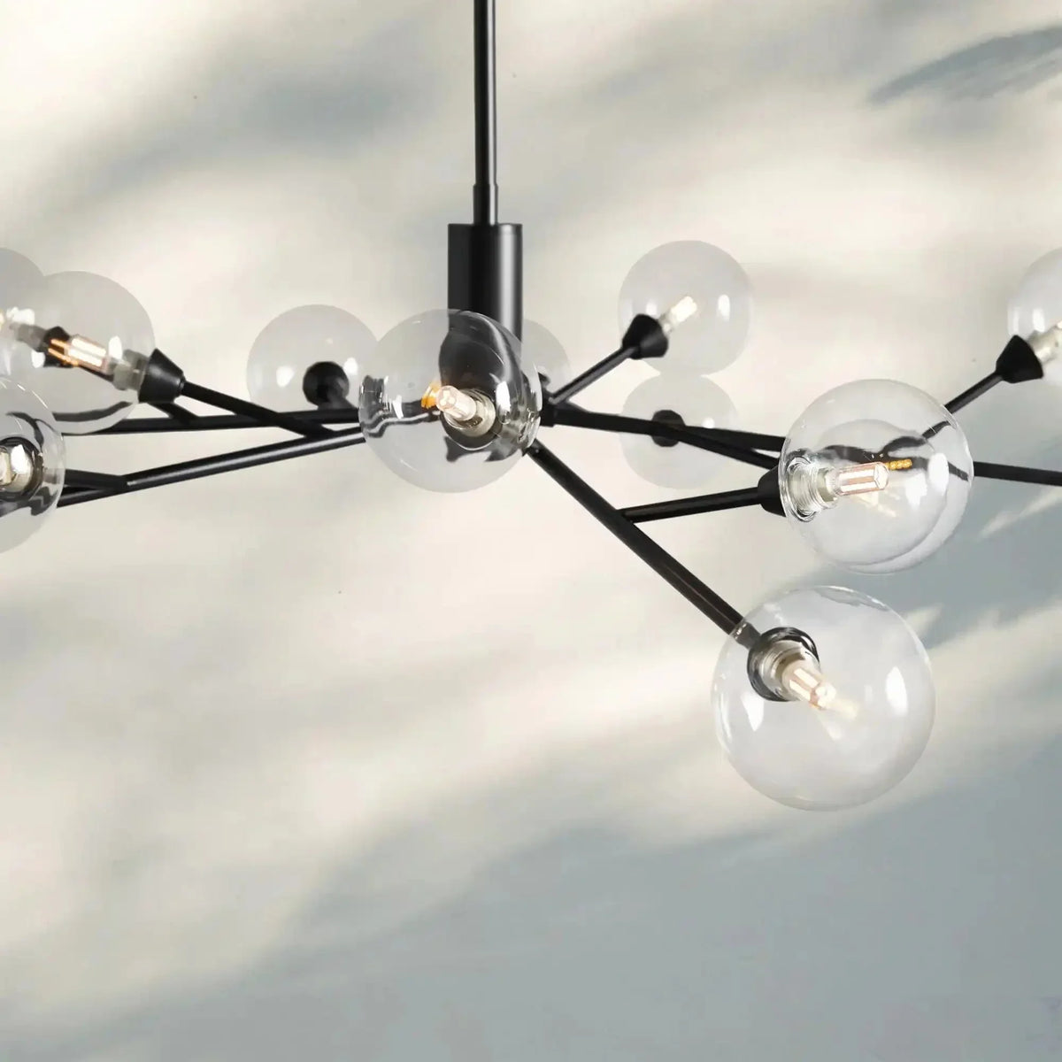 Apollo Round Midcentury Modern Starburst Chandelier in Antiqued Finishes