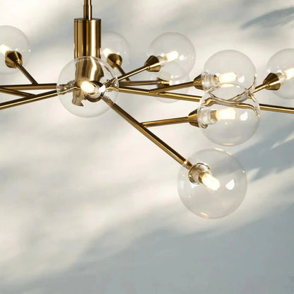 Apollo Round Midcentury Modern Starburst Chandelier in Antiqued Finishes