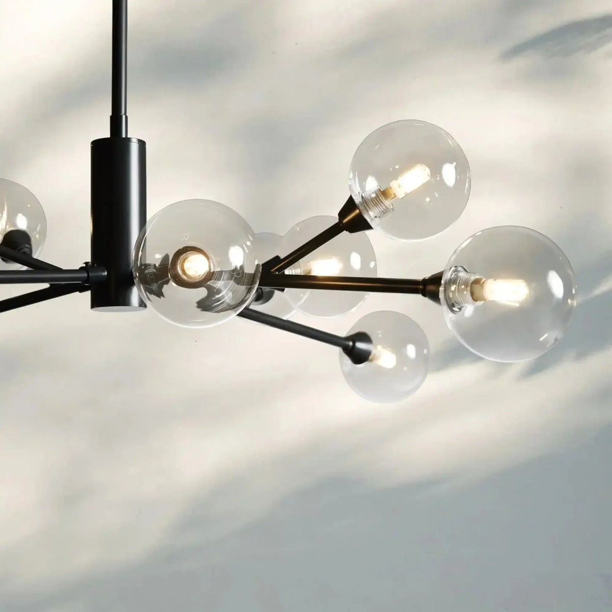 Apollo Round Midcentury Modern Starburst Chandelier in Antiqued Finishes