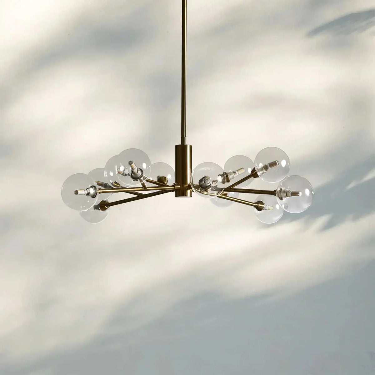 Apollo Round Midcentury Modern Starburst Chandelier in Antiqued Finishes