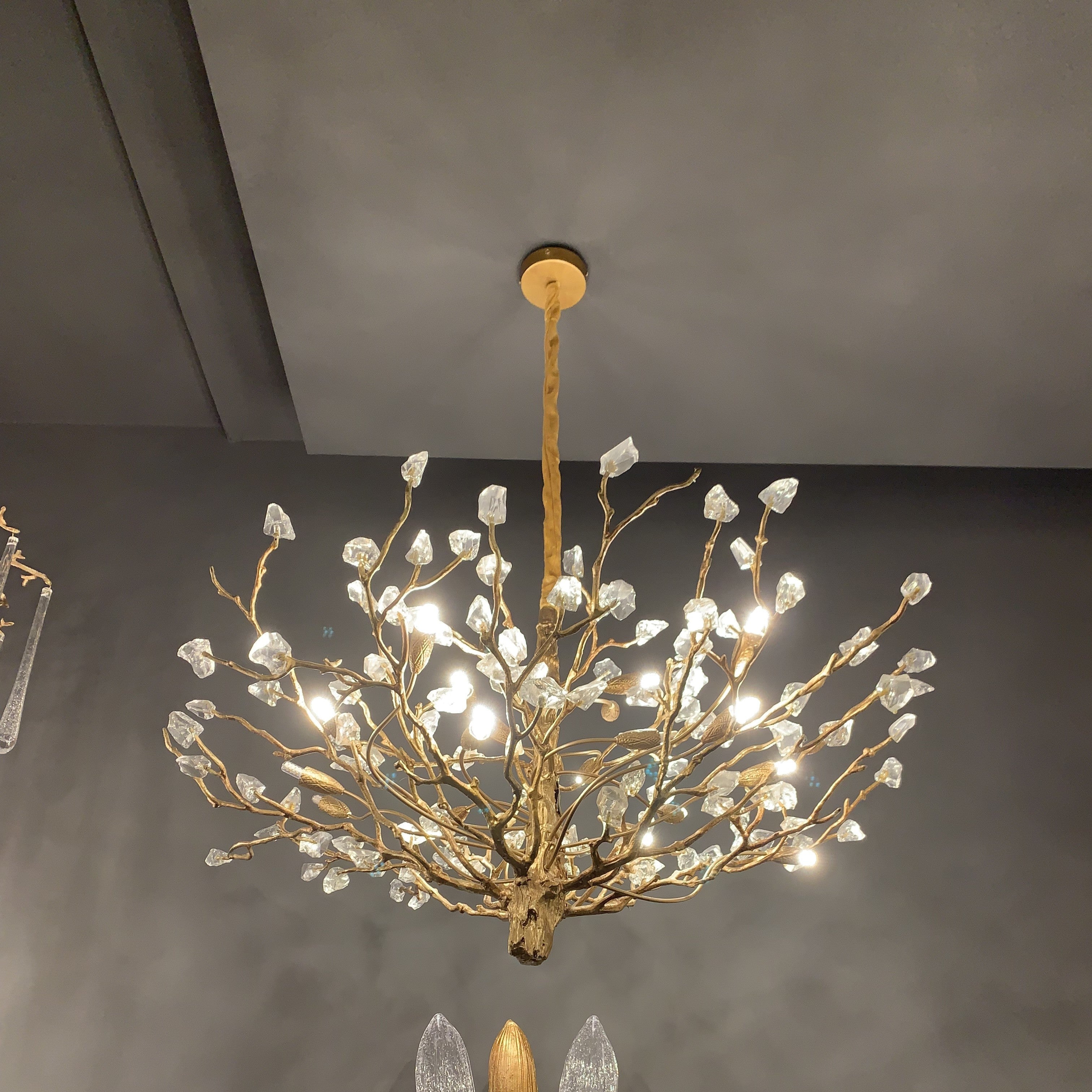 https://cdn.shopify.com/s/files/1/0736/8795/7790/products/creative-design-gemstone-branch-chandelier-for-living-roombedroom-merlin-lamps.jpg?v=1765362307