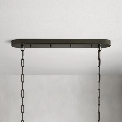 https://cdn.shopify.com/s/files/1/0736/8795/7790/files/ghiaccio-glass-oval-chandelier-5465-merlin-lamps-6.jpg?v=1765380222