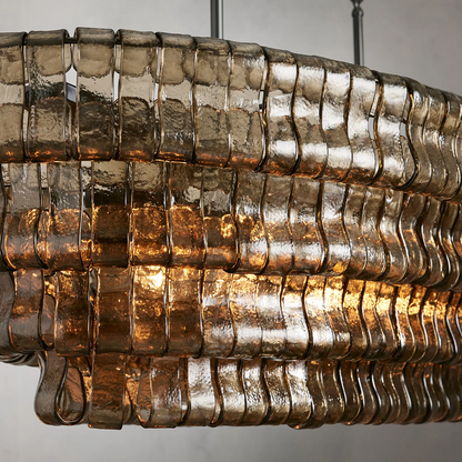 https://cdn.shopify.com/s/files/1/0736/8795/7790/files/ghiaccio-glass-oval-chandelier-5465-merlin-lamps-8.png?v=1765380227