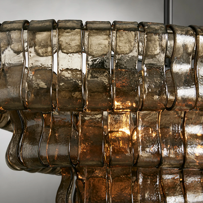 https://cdn.shopify.com/s/files/1/0736/8795/7790/files/ghiaccio-glass-oval-chandelier-5465-merlin-lamps-9.png?v=1765380230