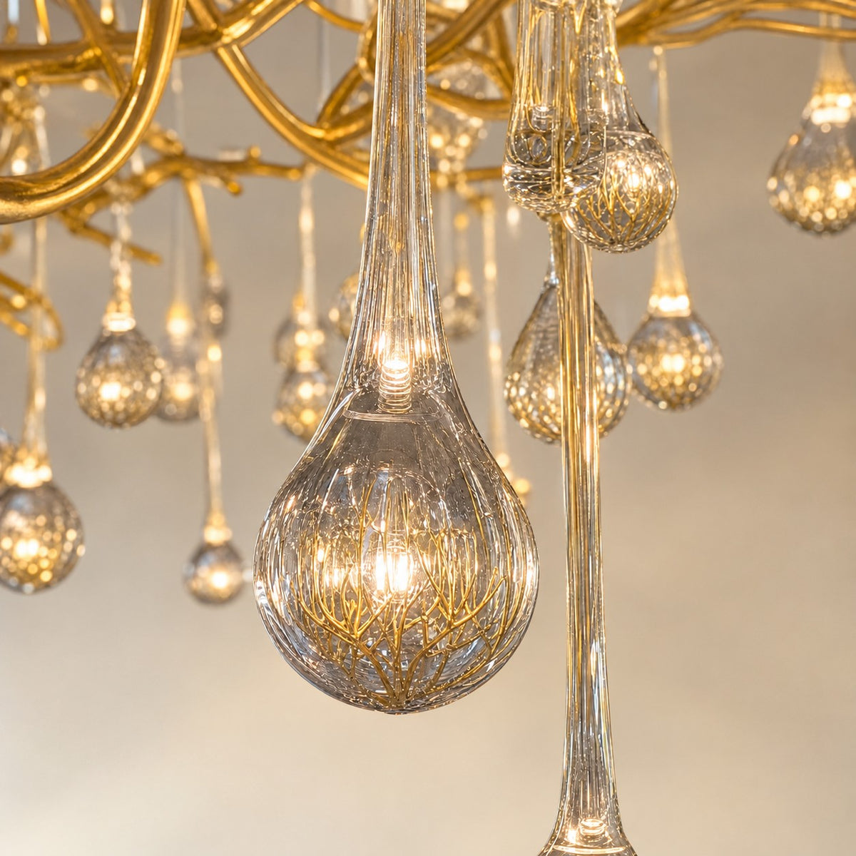 Gold Metal and Clear Crystal Teardrop Waterfall Chandelier