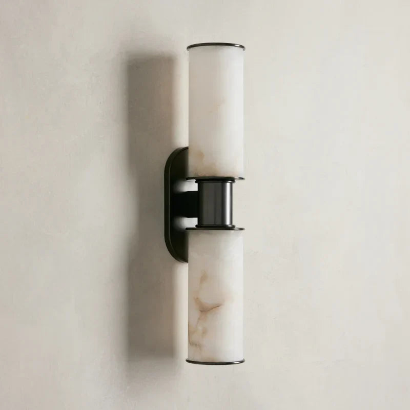 https://cdn.shopify.com/s/files/1/0736/8795/7790/files/harlin-2-light-wall-sconce-in-alabaster-merlin-lamps-2.webp?v=1765382503