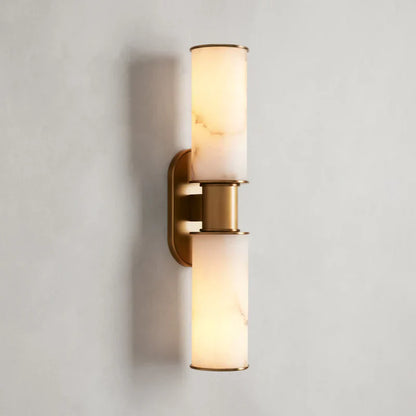 https://cdn.shopify.com/s/files/1/0736/8795/7790/files/harlin-2-light-wall-sconce-in-alabaster-merlin-lamps.webp?v=1765382502
