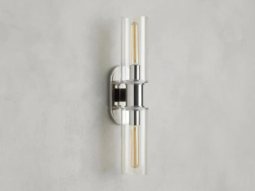 https://cdn.shopify.com/s/files/1/0736/8795/7790/files/harlin-2-light-wall-sconce-in-clear-merlin-lamps-10.webp?v=1765408726