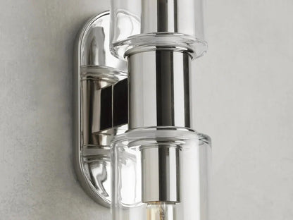 https://cdn.shopify.com/s/files/1/0736/8795/7790/files/harlin-2-light-wall-sconce-in-clear-merlin-lamps-11.webp?v=1765408727