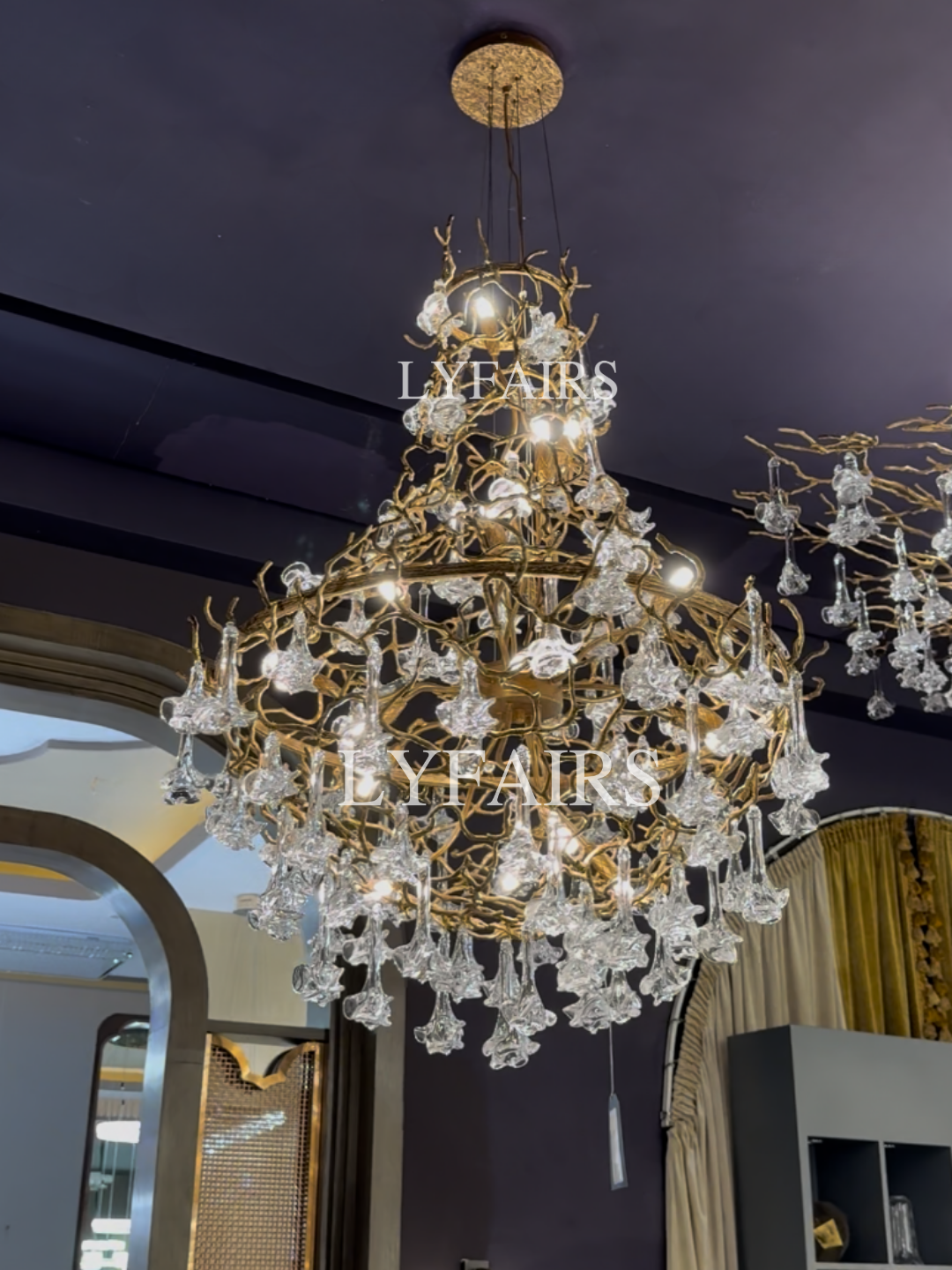 Nature-inspired Brass Tree Chandelier with Glazed Glass Flowers