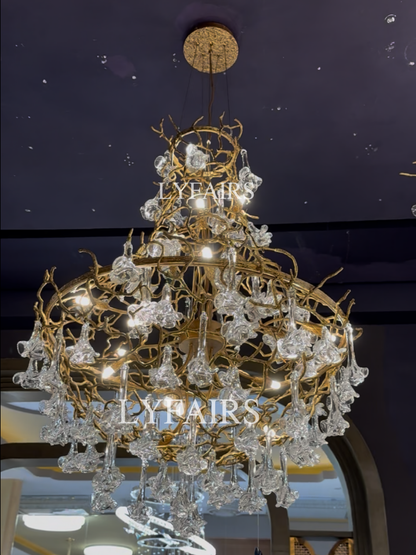 Nature-inspired Brass Tree Chandelier with Glazed Glass Flowers