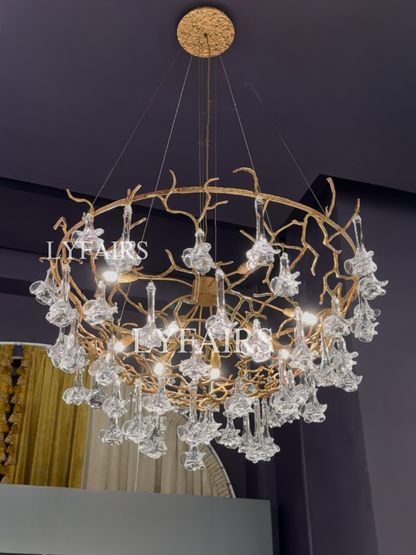 Nature-inspired Brass Tree Chandelier with Glazed Glass Flowers