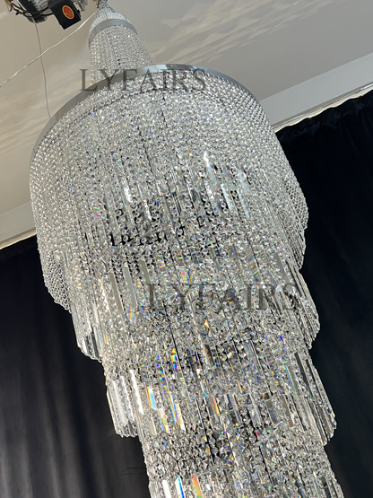 https://cdn.shopify.com/s/files/1/0554/8562/8591/files/lyfairsModernCrystalTasselChandelierforFoyerStaircase_8.png?v=1775619528