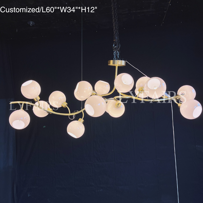 https://cdn.shopify.com/s/files/1/0554/8562/8591/files/lyfairsModernHand-blownGlassGlobesBranchChandelierforLivingDiningRoomKitchenIsland_9.png?v=1773475187