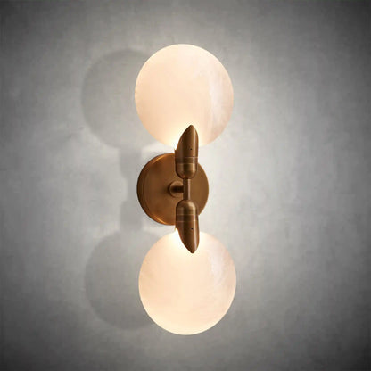 https://cdn.shopify.com/s/files/1/0736/8795/7790/files/lyla-double-sconce-merlin-lamps.webp?v=1765415310