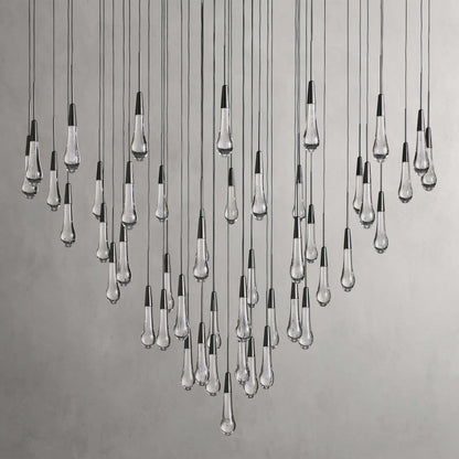 https://cdn.shopify.com/s/files/1/0736/8795/7790/files/solitaire-modern-17-24-36-58-round-chandelier-lighting-merlin-lamps-11.jpg?v=1765374446