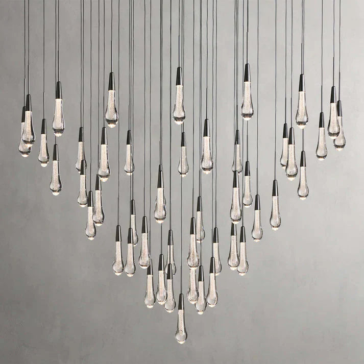 https://cdn.shopify.com/s/files/1/0736/8795/7790/files/solitaire-modern-17-24-36-58-round-chandelier-lighting-merlin-lamps-12.webp?v=1765374448