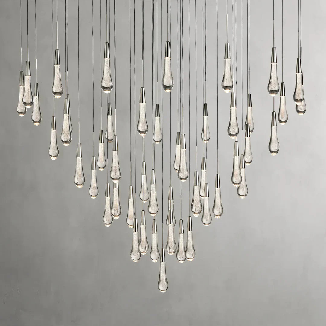 https://cdn.shopify.com/s/files/1/0736/8795/7790/files/solitaire-modern-17-24-36-58-round-chandelier-lighting-merlin-lamps-13.webp?v=1765374449