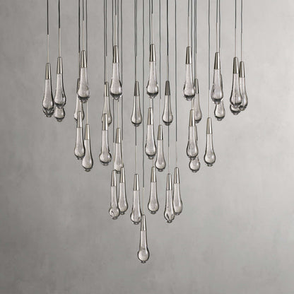 https://cdn.shopify.com/s/files/1/0736/8795/7790/files/solitaire-modern-17-24-36-58-round-chandelier-lighting-merlin-lamps-15.jpg?v=1765374452
