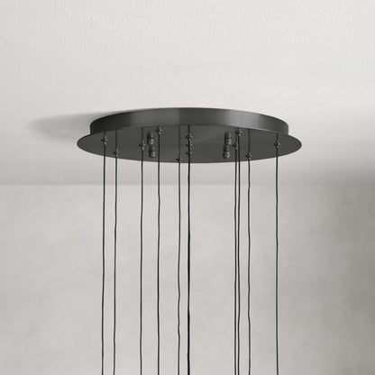 https://cdn.shopify.com/s/files/1/0736/8795/7790/files/solitaire-modern-17-24-36-58-round-chandelier-lighting-merlin-lamps-16.jpg?v=1765374454
