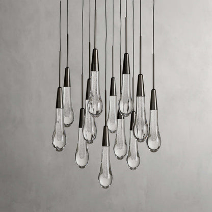 https://cdn.shopify.com/s/files/1/0736/8795/7790/files/solitaire-modern-17-24-36-58-round-chandelier-lighting-merlin-lamps-3.jpg?v=1765374430