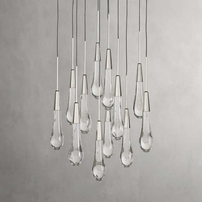 https://cdn.shopify.com/s/files/1/0736/8795/7790/files/solitaire-modern-17-24-36-58-round-chandelier-lighting-merlin-lamps-33.jpg?v=1765374487