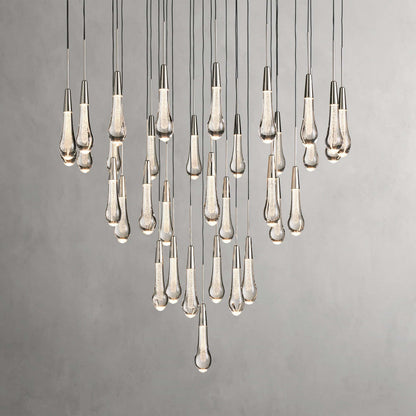 https://cdn.shopify.com/s/files/1/0736/8795/7790/files/solitaire-modern-17-24-36-58-round-chandelier-lighting-merlin-lamps-36.jpg?v=1765374494