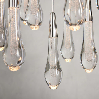 https://cdn.shopify.com/s/files/1/0736/8795/7790/files/solitaire-modern-17-24-36-58-round-chandelier-lighting-merlin-lamps-5.jpg?v=1765374434