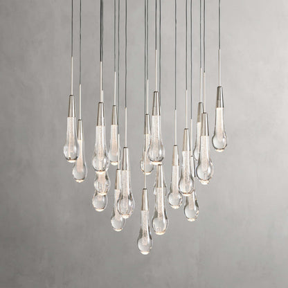 https://cdn.shopify.com/s/files/1/0736/8795/7790/files/solitaire-modern-17-24-36-58-round-chandelier-lighting-merlin-lamps-9.jpg?v=1765374442