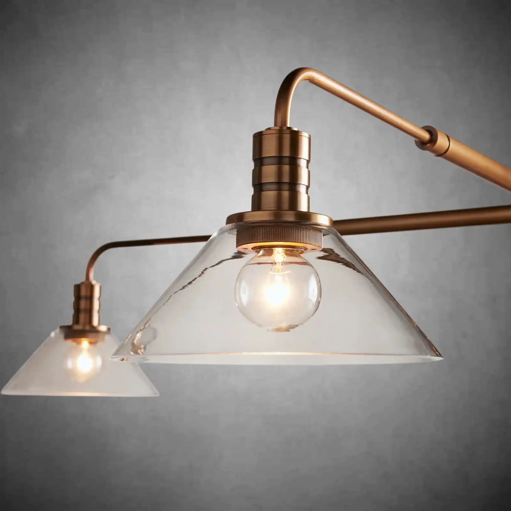 https://cdn.shopify.com/s/files/1/0736/8795/7790/files/theron-glass-round-chandelier-brass-2.webp?v=1765849535